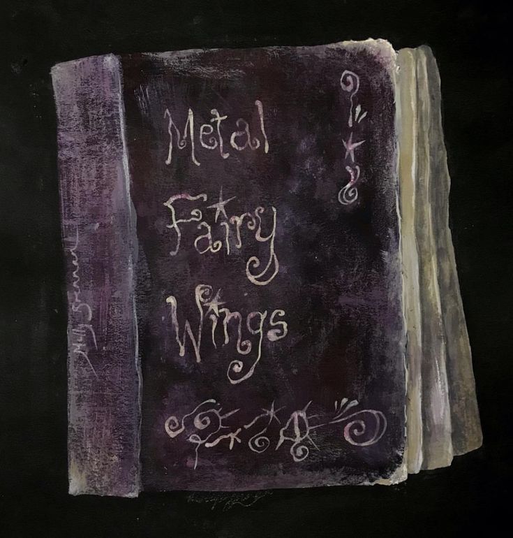 a book with writing on it that says metal fairy wings