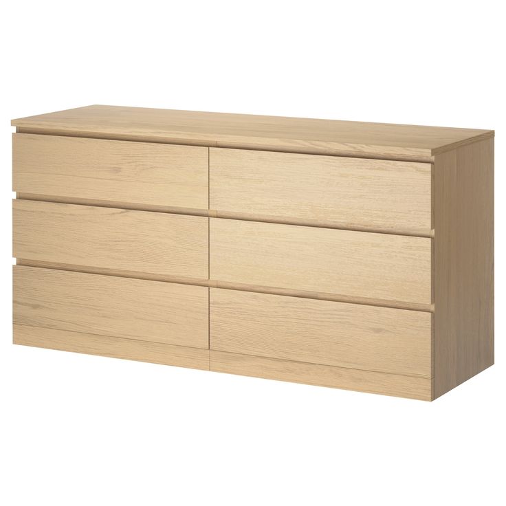 a large wooden dresser with four drawers