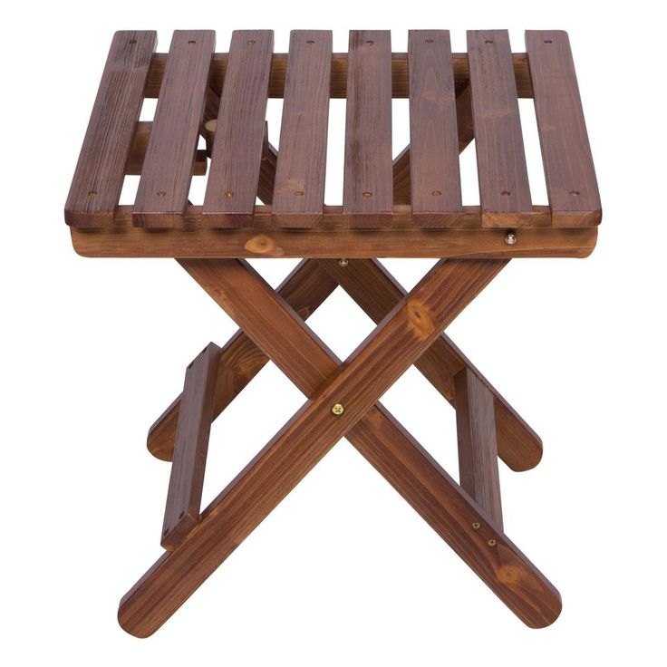 a small wooden table with two crossed legs