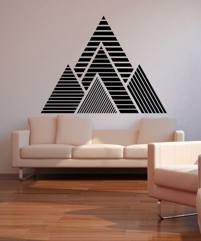 an image of a living room with a wall sticker on the back of it