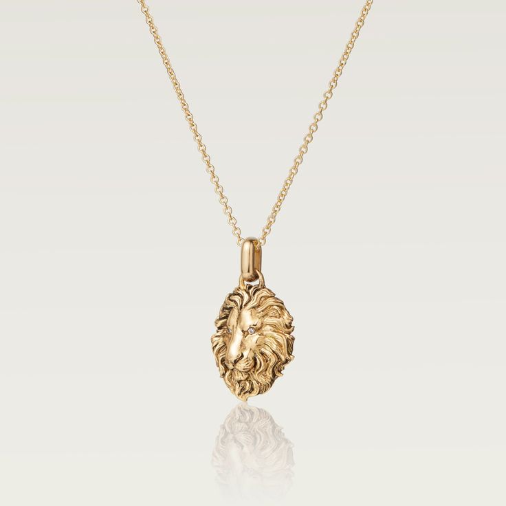 Our Lion Necklace from the Lion Collection is crafted from 14K Gold Vermeil with diamonds for the eyes. The Lion symbolizes strength, courage and protection. Designed in our New York City workshop, the Lion Necklace is bold, elegant, durable and made for daily use. ____ Material: 14K Gold, Sterling Silver & DiamondsDimensions: 16mm x 17mmChain Length: 18 inches Style: Unisex Lion Necklace, Timeless Jewelry, The Lion, Gold Vermeil, Solid Gold, York City, New York City, Lion, 18k Gold