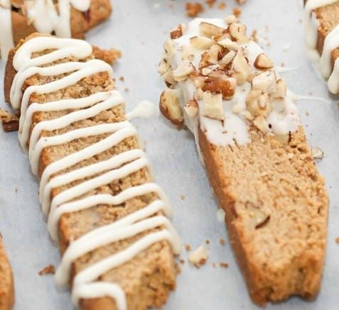 bread with white icing and nuts on it