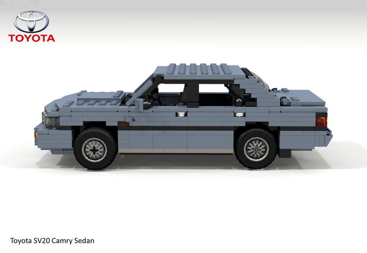 an image of a toy car made out of legos on a white background with the toyota logo above it