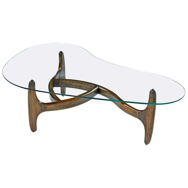 a glass and wood coffee table with an unusual shaped design on the top, sitting in front of a white background