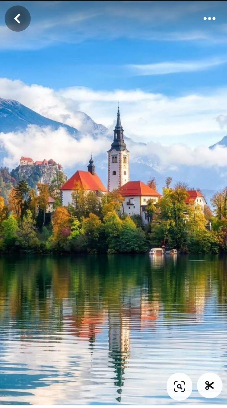 an image of a beautiful lake with mountains in the background