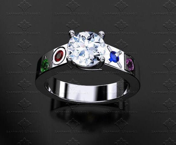 a white gold ring with three colored stones