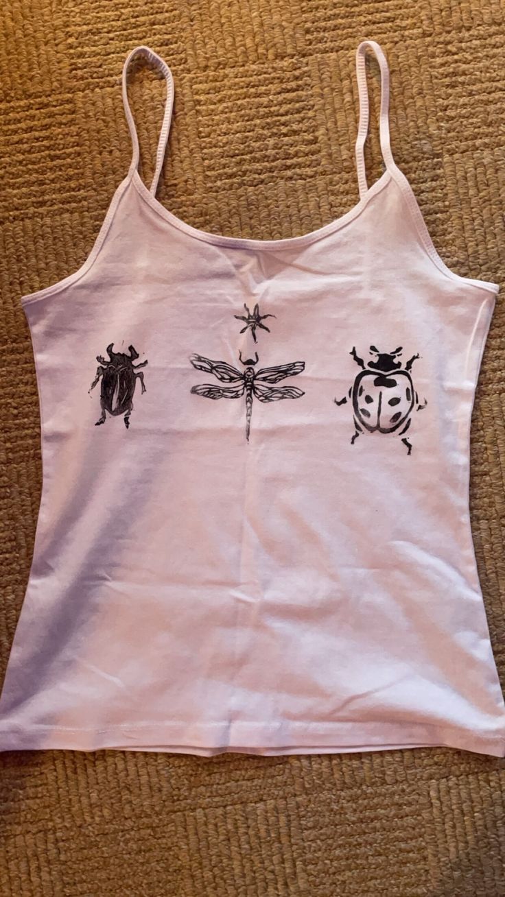 hand printed insect tank top / cami made using lino and fabric ink. lovely unique insect design showing a beetle, dragonfly, ladybird, and a little star. sizes XS-XL are available, and item is made to order so let me know your size. very fashionable, one of a kind, cute and comfy Fabric Marker Designs T Shirts, Crafts For Clothes, Grunge Tank Top Diy, How To Put Print On Shirt, Homemade Graphic Tees, Fashion Items Accessories, Cool Diy Shirts, Doodle T Shirt, Simple Screen Print