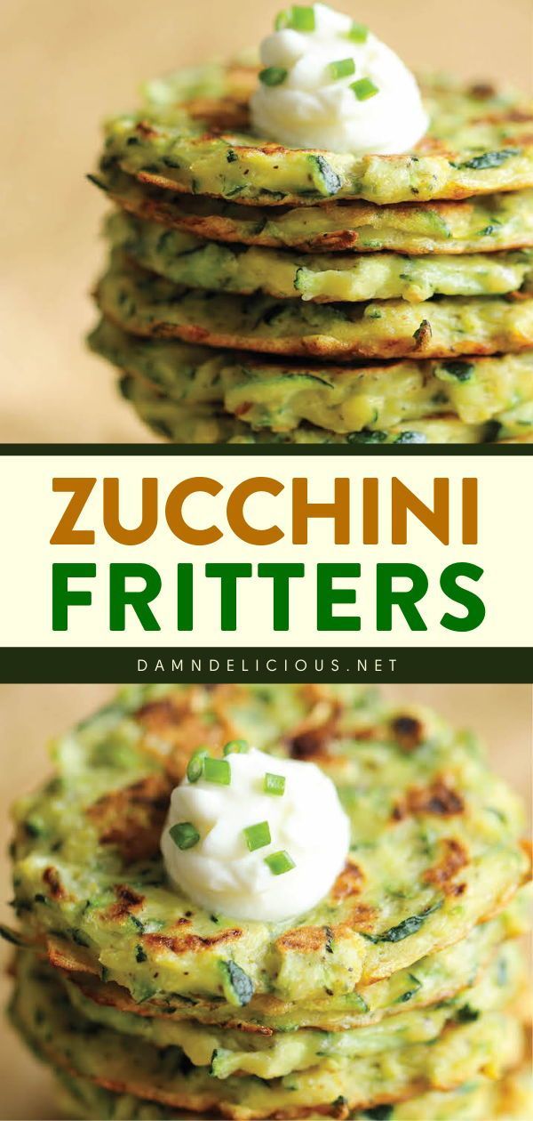 zucchini fritters are stacked on top of each other and topped with sour cream