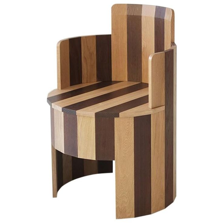 a chair made out of wood with stripes on it