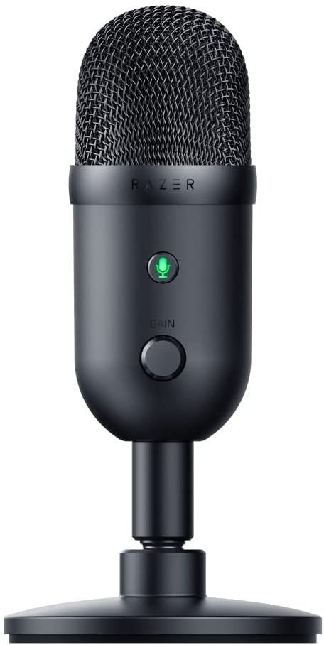 an image of a microphone that is on top of a stand with a green light