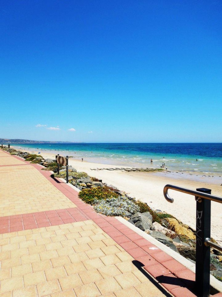 the walkway to the beach is empty and clear