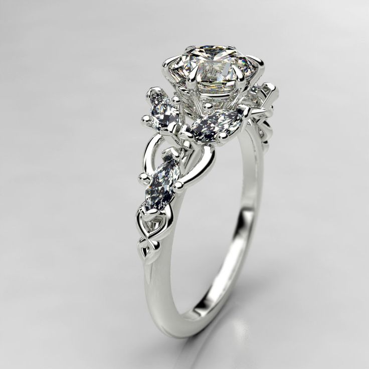 a white gold ring with diamonds on it