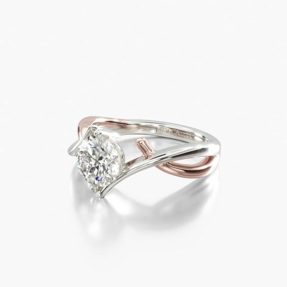 a white and pink gold ring with a diamond in the center, on a white background