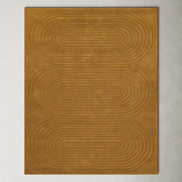 a brown rug with wavy lines on it