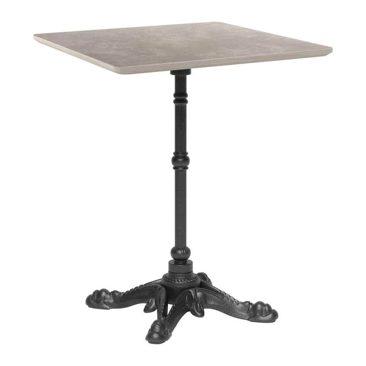 a square table with an iron base