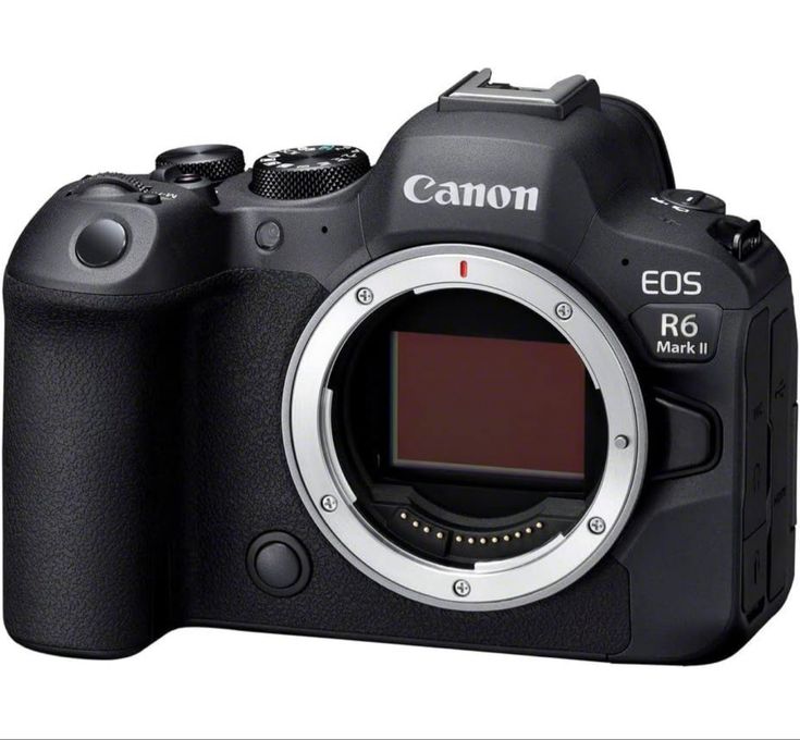 the canon eos r6 camera is shown with its lens up close to it's body