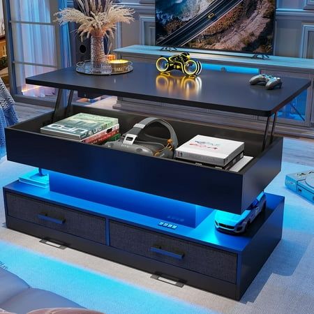 an entertainment center in the middle of a living room with a television on it's stand