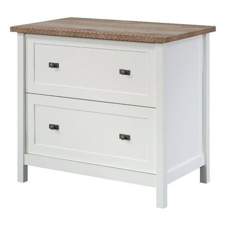 a white dresser with two drawers and a wooden top