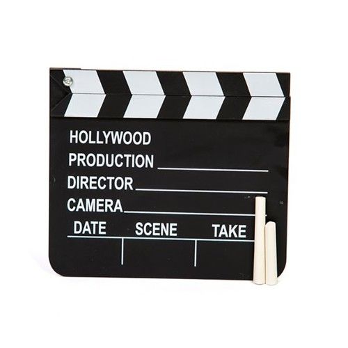 a black and white clapper board with the words hollywood on it's side