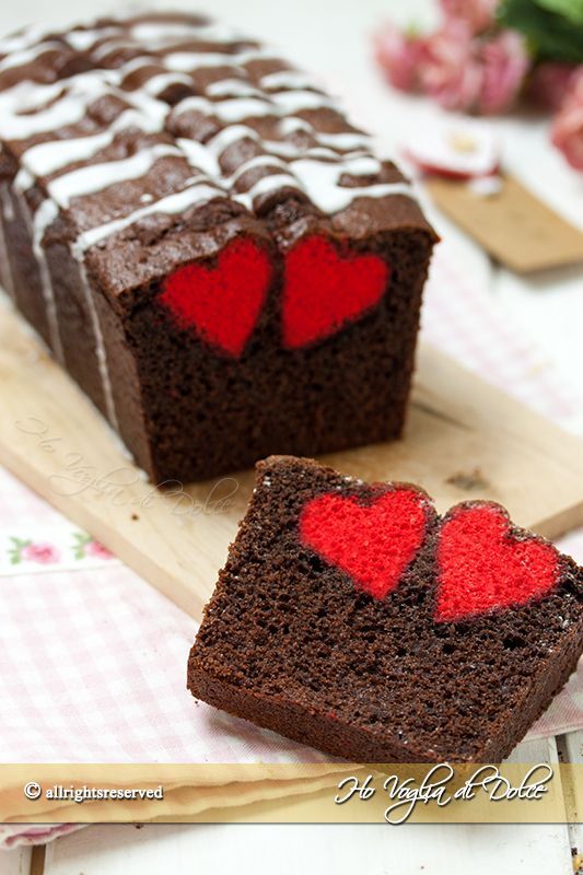 two slices of chocolate cake with red hearts on them