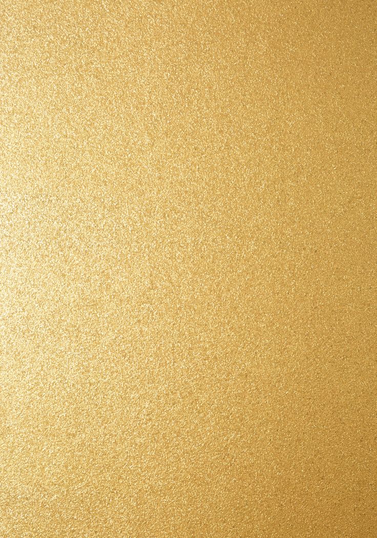 a close up view of a shiny gold surface