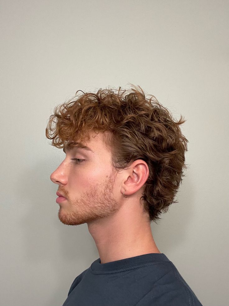 Half Mullet Curly Hair Men, Curly Haired Mullet, Short Mens Curly Hair, Men Copper Hair, Mens Permed Hairstyles, Medium Length Curly Hair Men Short Sides, Ginger Hair Styles Men, Soft Mullets Guys, Mullet On Curly Hair Men