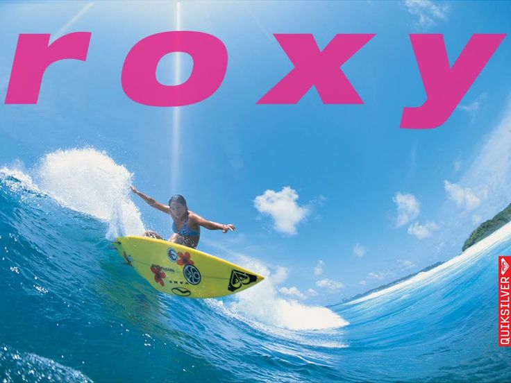 a man riding a surfboard on top of a wave in the ocean with words roxy above him