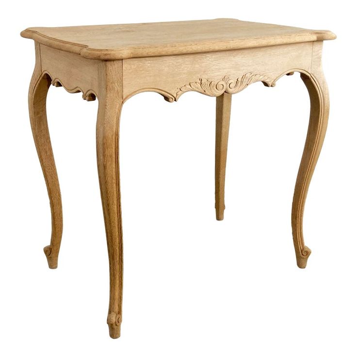 Vintage French Louis XV style bleached wood side table with carved apron and turned legs. Reminiscent of 19th C. Hand-crafted with beveled rounded top and thick aprons featuring carved foliate motif. Graceful scrolled cabriole legs feature escargot tips on the feet for a classically French touch.  Natural age wear. Sturdy. Bleached Wood Table, French Furniture Design, Bleached Wood, Wood Side Table, Work Project, French Table, Cabriole Legs, Side Table Wood, Beautiful House