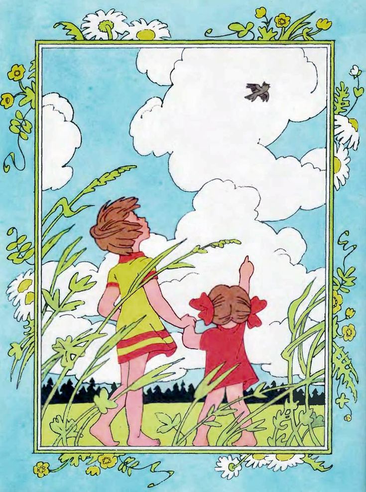 two children are walking through tall grass