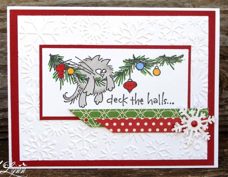 a handmade christmas card with a cat on the front and words deck the hall