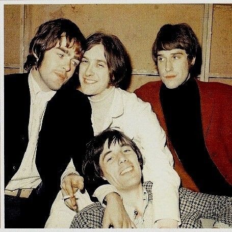 the beatles are posing for a photo together