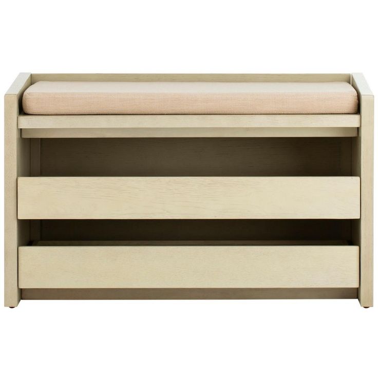 a wooden bench with two drawers and a cushion on top