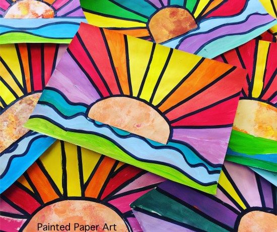 colorful paper art with sunbursts painted on it