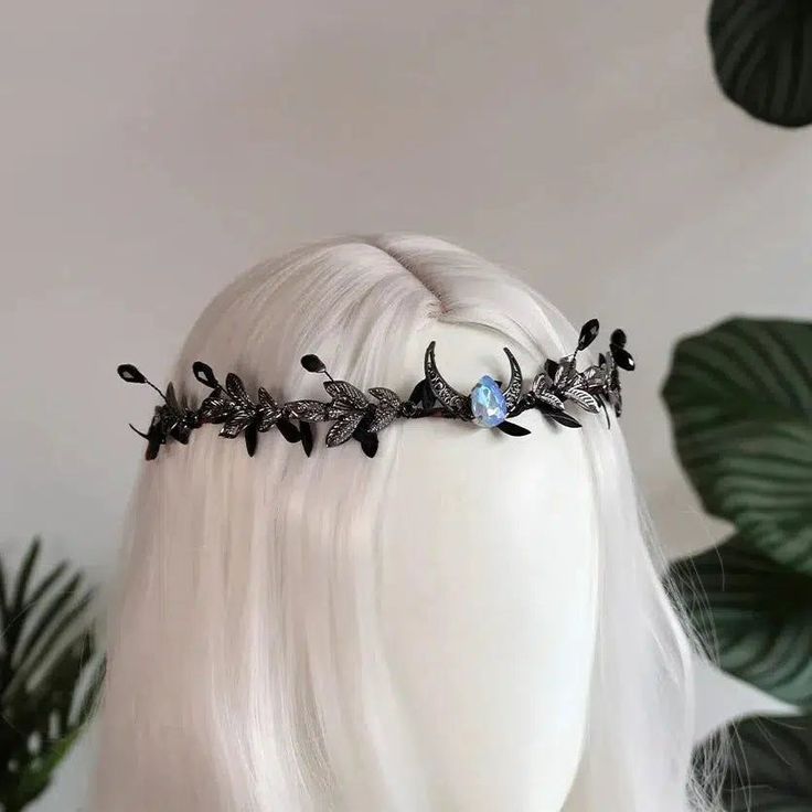 🌙 Embrace Your Inner Magic with Our Crystal Elf Tiara! 🧝‍♀️ Enhance your look with the ethereal charm of our Witchy Crown adorned with Wicca Pagan Symbols. Perfect for any occasion, this tiara combines elegance with spiritual symbolism. Whether you're channeling your inner elf or celebrating your Wiccan path, this piece is a must-have. ✨ Why Choose Our Wicca Pagan Hair Jewelry? Unique Design: Featuring crystals and adorned with symbols like the Triple Moon, Crescent Moon, Pentacle, Butterfly, and Bat, this tiara adds magic to any hairstyle. High-Quality Materials: Crafted with care, our Mystic Hair Crown ensures lasting beauty and durability. Versatile Style: Suitable for various themes, from gothic to celestial, this Witchy Hair Accessory enhances any ensemble effortlessly. This Enchant Witchy Crown, Elf Tiara, Elf Crown, Witchy Hair, Moon Pentacle, Witch Hair, Spiritual Clothing, Pagan Symbols, Wiccan Symbols