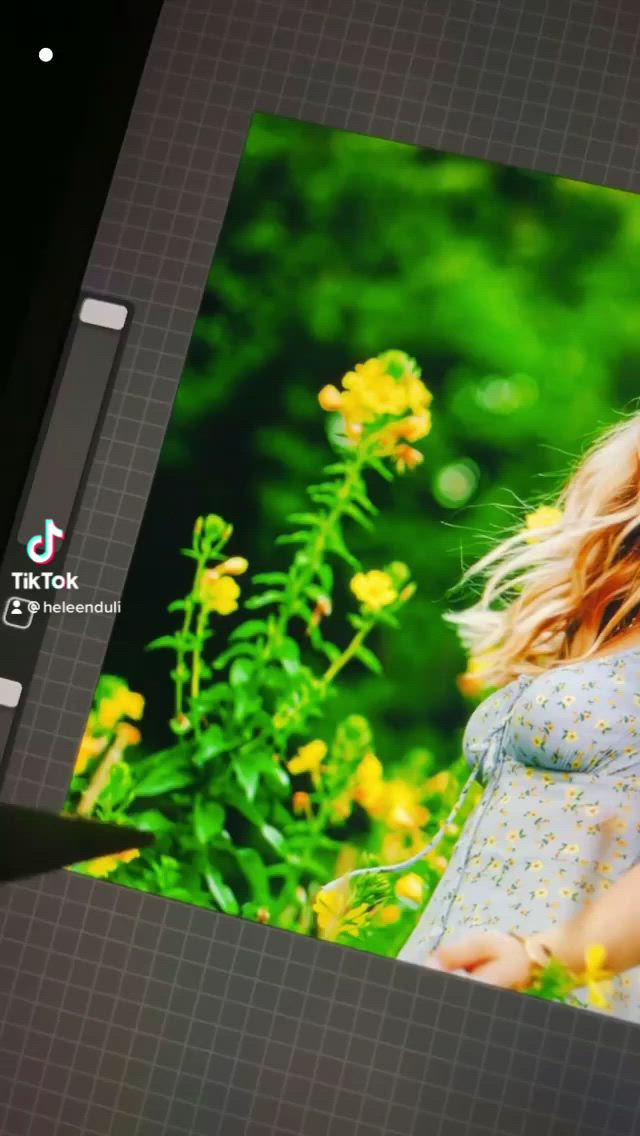 This may contain: a woman with flowers and butterflies on her face in front of a flowery background