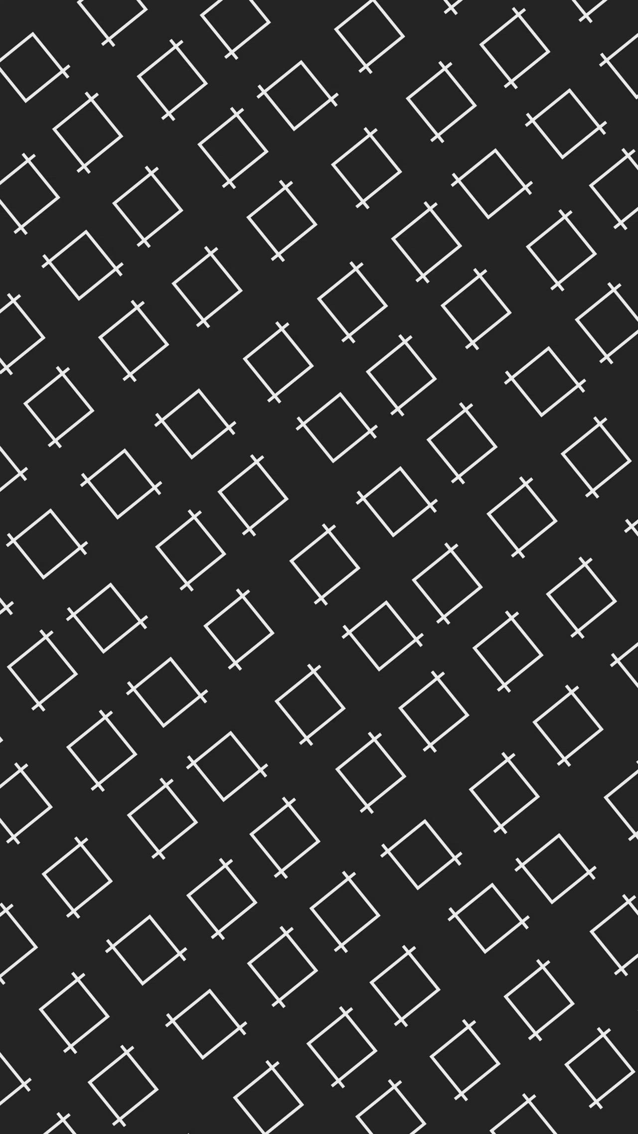 This may contain: an abstract black and white pattern with crosses in the center, on a dark background