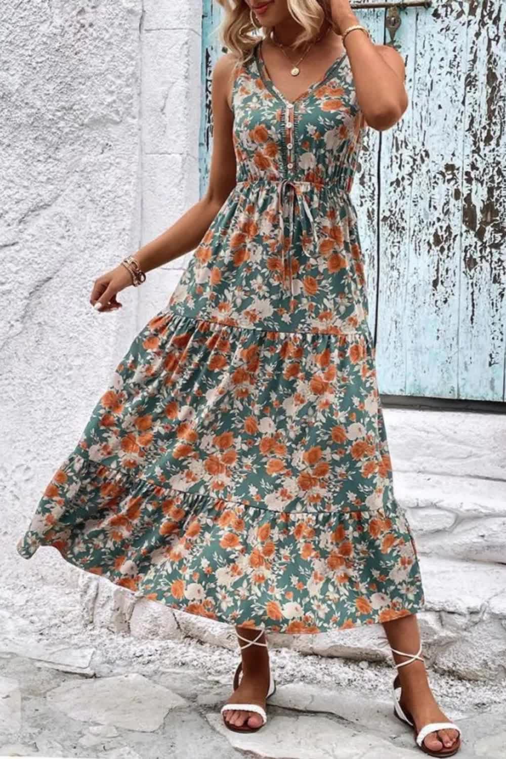 "Embrace summer elegance with this Women's Floral Beach Dress. With its V-neck and sleeveless design, it's perfect for beach holidays. Radiate effortless charm and style with this breezy dress, ideal for soaking up the sun or strolling along the shore."