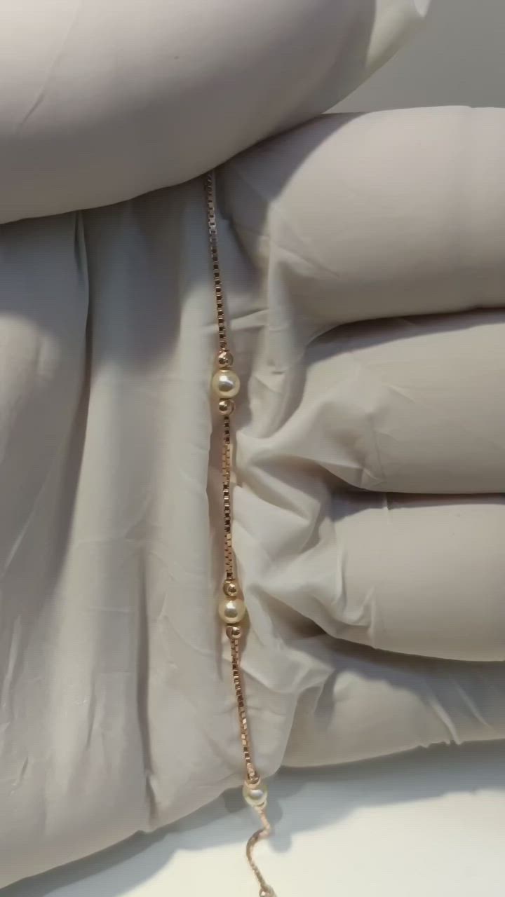 This contains an image of: This Pearl chain necklace looks splendid in the finest jewels.