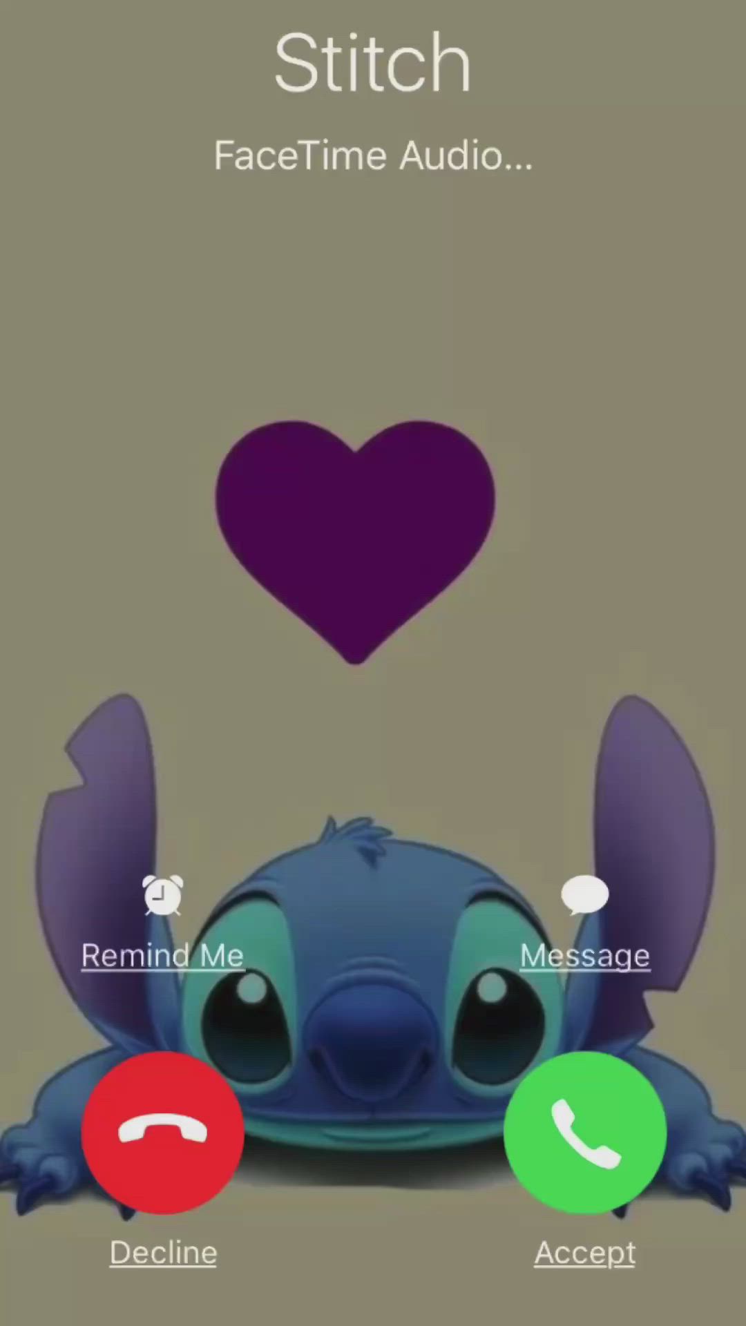 This may contain: an image of stitch on the phone with two different buttons and one has a heart