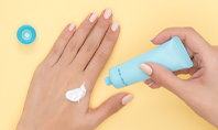 Female Hand Holding Cream Tube Presentation Presentation Template