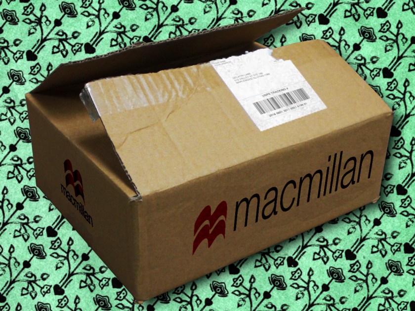 A cardboard book box with the Macmillan logo.