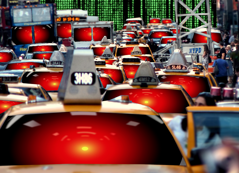 A Times Square traffic jam; all the cars’ windscreens have been filled with the menacing red eye of HAL9000 from 2001: A Space Odyssey. The background has been filled with a Matrix “code-waterfall” effect.