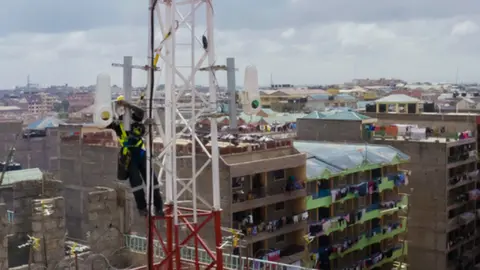 Alphabet X Hardware being fixed to a mast