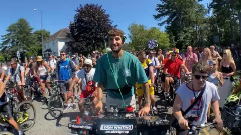 Dom Whiting on his bicycle modified for DJ use.