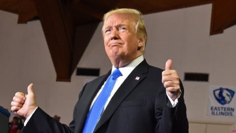 US President Donald Trump arrives at a rally at Eastern Kentucky University, in Richmond, Kentucky, on 13 October 2018