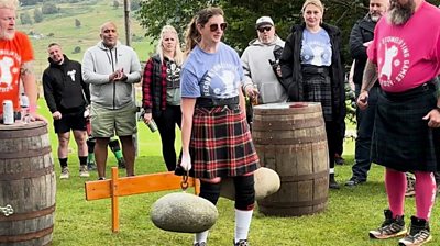 Gemma Doherty carries two larges stones