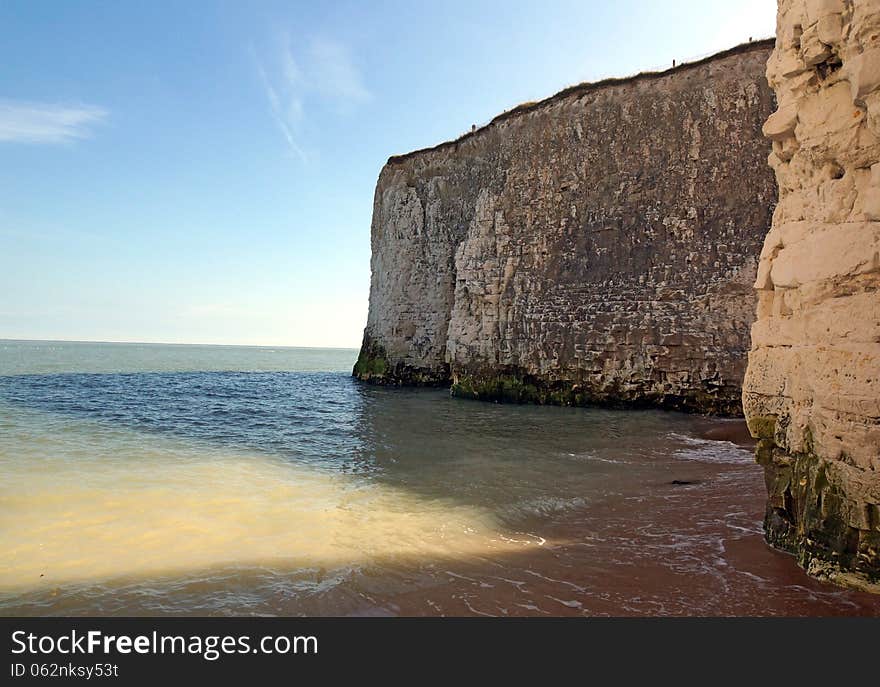 The chalk cliffs of Botany Bay Kent uk that line the beach front on the coast line. The chalk cliffs of Botany Bay Kent uk that line the beach front on the coast line