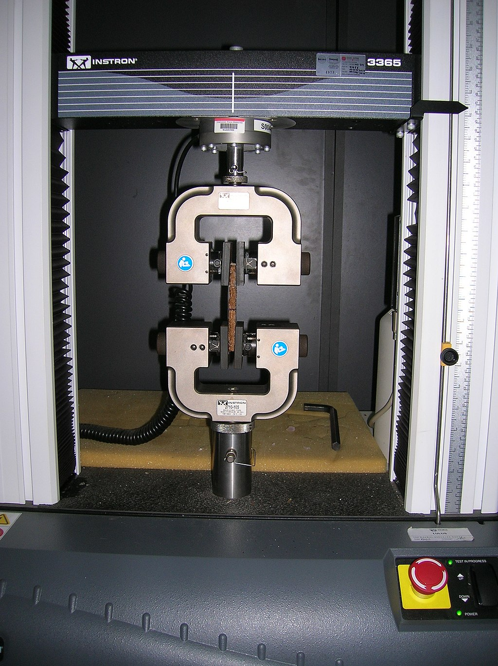 Universal Testing Machine testing a coir composite.