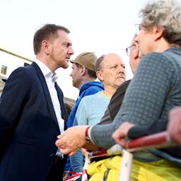 Michael Kretschmer bei einem Demokratie-Protest in Berlin.