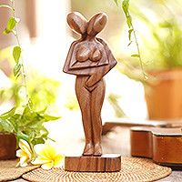 Wood sculpture, 'Don't Let Go' - Romantic Suar Wood Sculpture